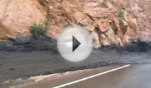 Mudslide sweeps away car in Colorado - video